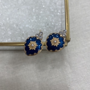 Blue and gold ear studs